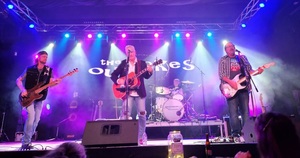 The Outtakes onstage at Konrad's