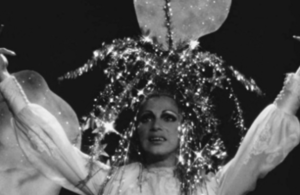 Scarecrow in a Garden of Cucumbers