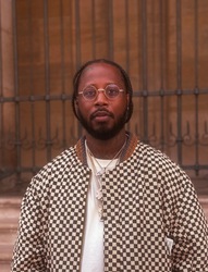 Multi-Disciplinary Artist Al-baseer Holly Curates "Back to My Roots" Exhibition at 2025 Roots Picnic