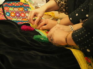 Community Gathering: Kochiani Dress Showcase, Peace Dove Signing & Free Mending Fair