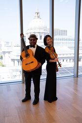 Noontime Concerts presents Mark Simons, Guitar and Heeguen Song, Violin