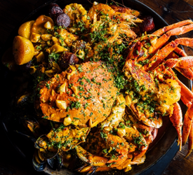 Thanksgiving To-Go: alaMar Dominican Kitchen Revives Its Legendary Seafood Family Feast