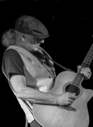 Multi-genre, Hall of Famer, Australian born rocker Michael Charles in acoustic concert