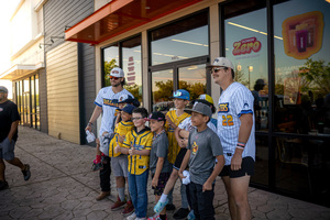 Dunkin' Grand Opening Celebration with Banana Ball Players