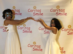 Caritas Smile, Dress in White Masquerade Ball
