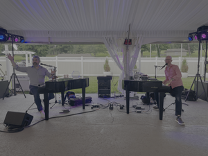 Dueling Pianos Under the Golf Tent at 1741 Pub & Grill