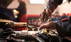 $15.96 for Oil Change, Filter Cleaning, Inspection, Fluids Check at George and Sons Auto Repair ($35 Value)