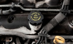 $20.28 for Oil-Change Package with Tire Rotation, Inspection, and History Report at Payless Car Sales ($124.84 Value)