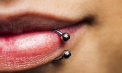 $20 or $50 Worth of Piercing at NYC Ink (Up to 58% Off)