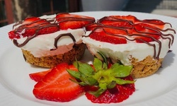 Vegan Food and Drink for Takeout and Dine-In If Available at The Stoop (Up to 42% Off). Two Options Available.