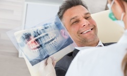 Dental Exam, Teeth Cleaning, and Digital X-rays with Optional Teeth Whitening Kit (Up to 91% Off) 