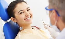 Dental Exam, Cleaning, and X-Rays, or Fluoride Application for Kids from Eman Hassan, DMD (Up to 80% Off)