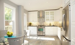 $49 for Home Renovation Package from Name Your Price Construction Corporation ($2,600 Value)