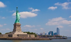 60-Minute Statue of Liberty and Ellis Island Sunset Cruise for 1, 2, or 4 at Attracions4us (Up to 58% Off)
