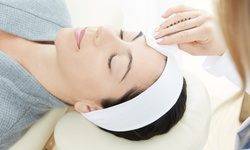 Custom Facial and Dermaplaning at Jubilation Massage & Skincare (Up to 55% Off). Three Options Available.