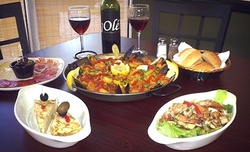 $10.50 for $24 Worth of Paella for Two or More at Paella House