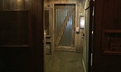 $137 for "The Caretaker"- Room-Escape-Game Experience for Up to 5 at America's Escape Game ($195 Value)