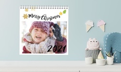 One, Two, or Five 11" x 8" or 12" x 12" Photo Calendars from Photobook America (Up to 85% Off)