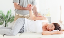 $32 for a Chiropractic Exam and 30-Minute Massage at Creative Chiropractic Solutions ($205 Value)