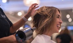 Haircut with Blowout or Partial Balayage, or a Keratin Treatment at Spa Logic (Up to 35% Off)