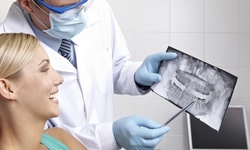 $93 for ComprehensiveExam,Full Mouthof Xrays,Teeth Cleaning&Flouride Application at The Bonner Dental Network $565 Value