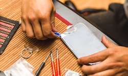 iPhone Glass and LCD Repair at Byte Me Repairs (Up to 87% Off). Six Options Available.