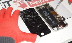iPhone or iPad Screen or Touch IC Repair at iTouch Repair (Up to 67% Off). 14 Options Available.