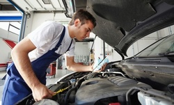 Conventional, High-Mileage, or Platinum-Synthetic Oil Change at Kwik Kar (Up to 32% Off)