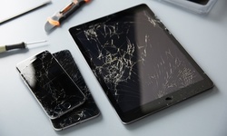 Screen Repair or Battery Replacement at iTech Repair Solutions (Up to 57% Off). Seven Options Available.