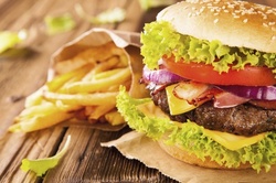 Dinner for Two or Four at OCI Bar and Grill (Up to 40% Off). Two Options Available.