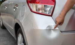 Paint Matching Dent Repair for One or Two Panels at La Familia Automotive & Flat Fix (Up to 45% Off)