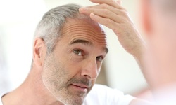 Three, Four, or Five Laser Hair-Restoration Treatments at Advanced Physical Medicine, Inc (Up to 87% Off)