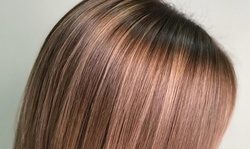 Haircut with Blowout, Partial Highlights, Ombre Highlights, or Balayage at Maxim Beautique (Up to 76% Off)