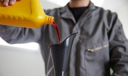 Conventional or Synthetic Oil Change at Auto Clinic USA (Up to 49% Off)