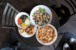 $10 For $20 Worth Of Pizza, Salad & Wings (Also Valid On Take-Out W/Min. Purchase Of $30)