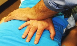 One, Two, or Three vouchers, Each Good for Exam and Adjustment at Meimaris Sports Chiropractic (Up to 89% Off)