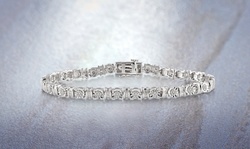 1/4 CTTW Diamond Tennis Bracelet with Baguette Accents in Silver By DiamondMuse