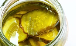 $13.50 for Two vouchers, Each Good for $10 Worth of Pickles at Frickles ($20 Value)