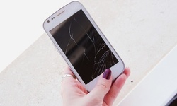 iPhone or iPad Repair, or Tempered Glass at Doctor Wireless (Up to 81% Off). 12 Options Available.