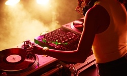 Two or Four Hours of DJ Services with Lighting from Evolution DJs (Up to 55% Off)