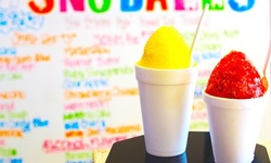 5 or 10 New Orleans–Style Sno-Ball Shaved Ice Treats and One Syrup at Snookies Cookies (45% Off)
