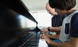 One 30-Minute Online Guitar or Piano Lesson with Live Instructor from Star Lessons (Up to 50% Off)