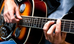 Guitar Tune-Up with Restringing or $40 Worth of Guitars and Accessories at Imperial Vintage Guitars (Up to 62% Off)