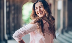 Haircut and Blow-Dry with Optional Color Touch-Up at Rita at the Last Tangle (Up to 40% Off)