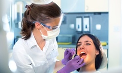 $60.50 for a Dental Package with Cleaning, X-rays, and Exam at The Dental Center of Eagan (Up to $376 Value)