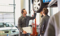 Wheel Alignment, Brake-Pad Replacement , or Wheel Balancing and Tire Rotation at Midas (Up to 56% Off)