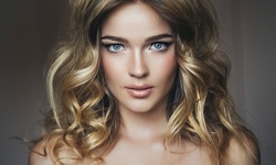 Women's Haircut with Optional Color or Highlights at Julius Monroe Salon & Spa (Up to 58% Off)