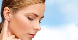 One or Three 60-Minute Chemical Peel Dermaplane Treatments with Foot Massage at Clayton Imaj (Up to 70% Off)