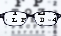 Prescription Eyewear with Optional Eye Exam at Erker's Fine Eyewear (Up to 91% Off)