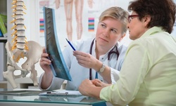 Chiropractic Exam with One or Three Adjustments at Premier Chiropractic Wellness Centre (Up to 75% Off)